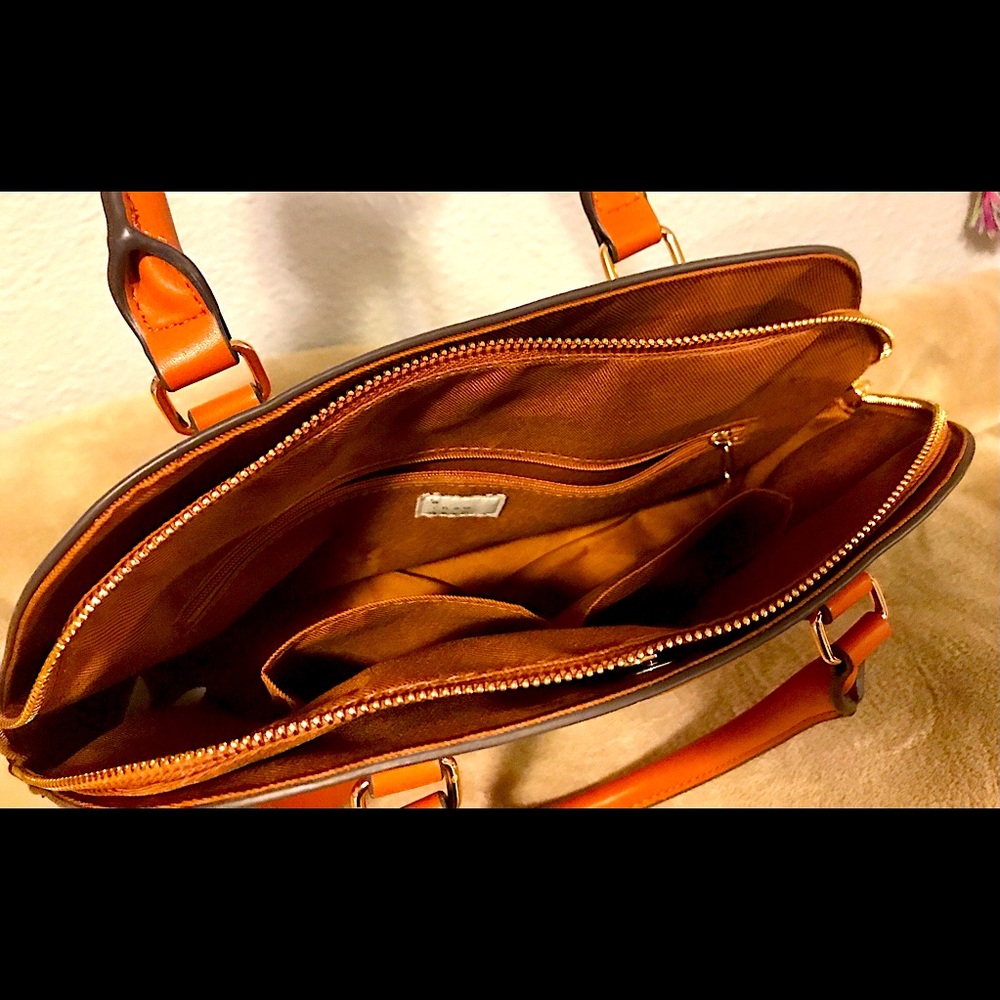 Target brand, a new day. 13x10 sturdy, terracotta satchel. handy travel/office.